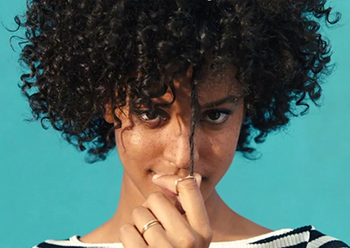 Model with coily hair