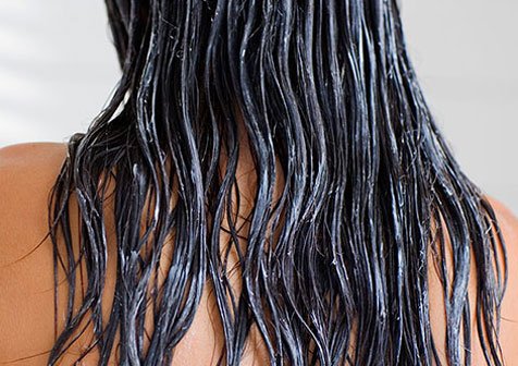 Close up of dark brown wet hair