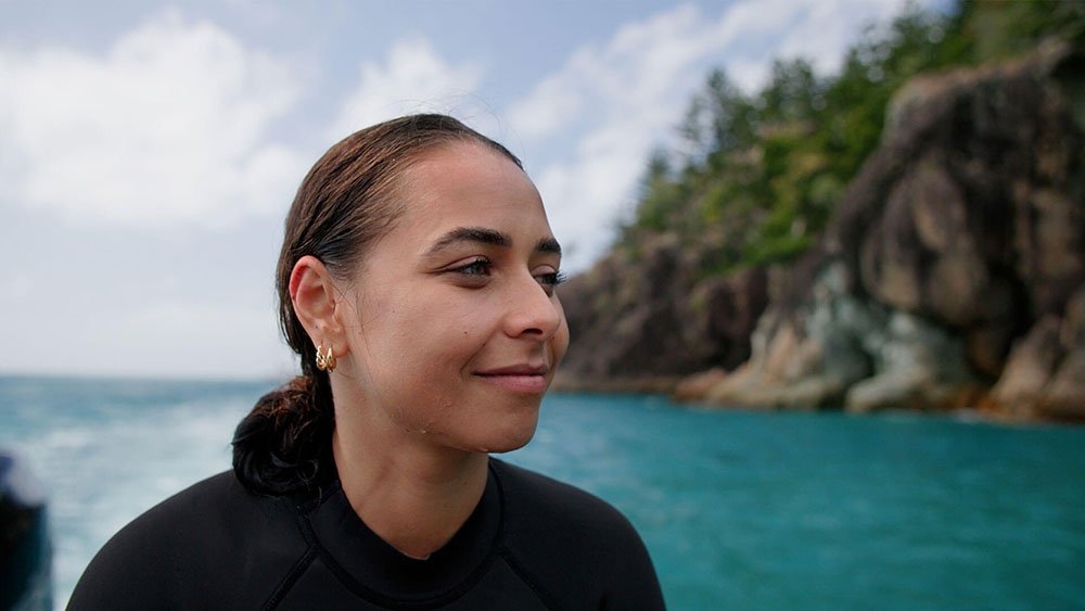 Brooke Blurton smiling on boat